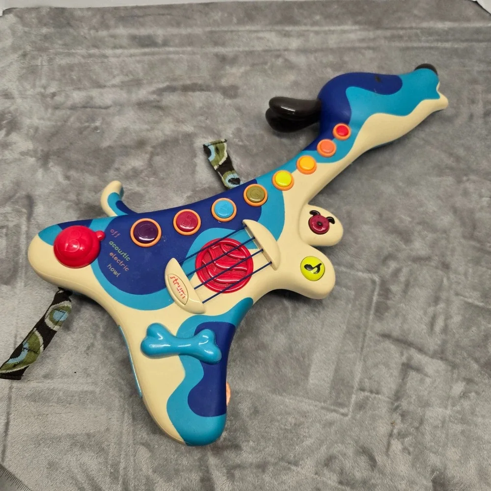 B. Toys Woofer‎ Hound Dog Guitar Musical Toy Blue Electric Acoustic Tested Works